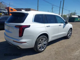 2023 Cadillac XT6 AWD Premium Luxury z VIN 1GYKPDRS4PZ182799, wystawiony jako IAAI lot #42161097 z przebiegiem 22 776 mil mil oraz . Historia ofert i sprzedaży dostępna na DreamBid. Obrazek 4.