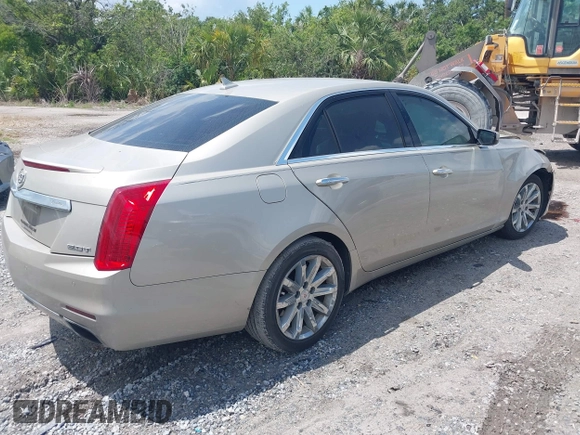2014 Cadillac CTS Luxury RWD z VIN 1G6AR5SX4E0141195, wystawiony jako IAAI lot #42144565 z przebiegiem 80 267 mil mil oraz . Historia ofert i sprzedaży dostępna na DreamBid. Obrazek 4.