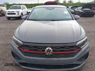 2021 Volkswagen Jetta GLI S with VIN 3VW6T7BU8MM011418, listed as a IAAI auction lot 40474082 with 76,619 mi miles and . Bid and sale history available at DreamBid. Image 6.