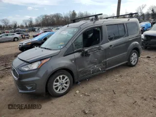 2022 Ford Transit Connect XLT with VIN NM0GS9F23N1543377, listed as a Copart auction lot 46463115 with 33,291 mi miles and Salvage title. Bid and sale history available at DreamBid. Image 1.