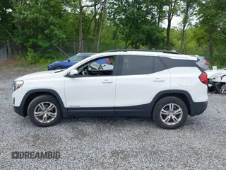 2019 GMC Terrain SLE z VIN 3GKALTEV3KL334650, wystawiony jako IAAI lot #42676507 z przebiegiem 74 280 mil mil oraz . Historia ofert i sprzedaży dostępna na DreamBid. Obrazek 14.