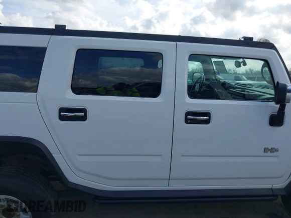 2003 Hummer H2 with VIN 5GRGN23U83H116139, listed as a IAAI auction lot 41495435 with Not Provided miles. Bid and sale history available at carsss.com. Image 13.
