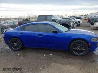 2022 Dodge Charger SXT with VIN 2C3CDXJG6NH143483, listed as a IAAI auction lot 41642211 with 111,484 mi miles. Bid and sale history available at carsss.com. Image 14.