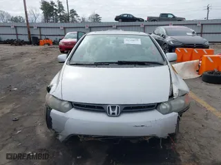 2008 Honda Civic Cpe EX-L with VIN 2HGFG12938H546744, listed as a IAAI auction lot 41526059 with 232,981 mi miles. Bid and sale history available at carsss.com. Image 12.