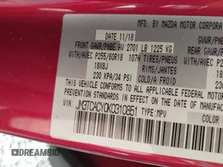 2019 Mazda CX-9 Touring with VIN JM3TCACY0K0310851, listed as a IAAI auction lot 42066395 with 91,046 mi miles and . Bid and sale history available at DreamBid. Image 9.