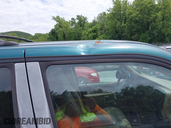 1998 Ford Explorer XL with VIN 1FMZU34E3WZA70790, listed as a IAAI auction lot 42746153 with 232,123 mi miles and . Bid and sale history available at DreamBid. Image 6.