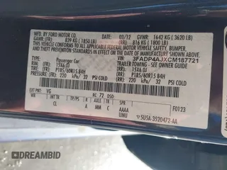 2012 Ford Fiesta S with VIN 3FADP4AJXCM187721, listed as a IAAI auction lot 41269984 with 118,474 mi miles. Bid and sale history available at carsss.com. Image 9.