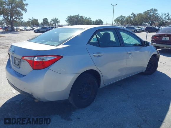 2014 Toyota Corolla L with VIN 2T1BURHE5EC006925, listed as a IAAI auction lot 40917569 with 130,761 mi miles and . Bid and sale history available at DreamBid. Image 4.