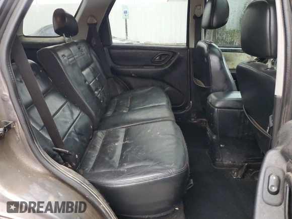2003 Ford Escape Limited with VIN 1FMCU941X3KD47977, listed as a Copart auction lot 85054974 with 303,773 mi miles and Salvage Title. Bid and sale history available at carsss.com. Image 11.