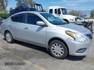 2015 Nissan Versa SV with VIN 3N1CN7AP1FL846929, listed as a IAAI auction lot 42068428 with 104,773 mi miles. Bid and sale history available at carsss.com. Image 1.