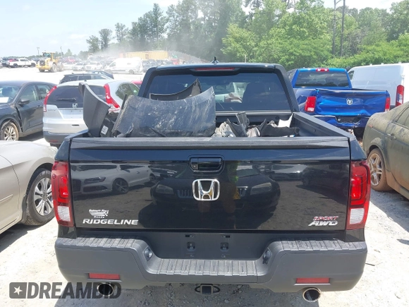 2021 Honda Ridgeline Sport with VIN 5FPYK3F15MB026171, listed as a IAAI auction lot 42265057 with 92,981 mi miles and . Bid and sale history available at DreamBid. Image 16.