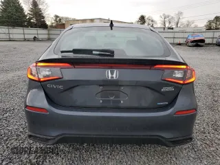2025 Honda Civic Sport Touring z VIN 19XFL4H93SE008549, wystawiony jako Copart lot #54105755 z przebiegiem 1353 mil mil oraz Szkody całkowita. Historia ofert i sprzedaży dostępna na DreamBid. Obrazek 6.