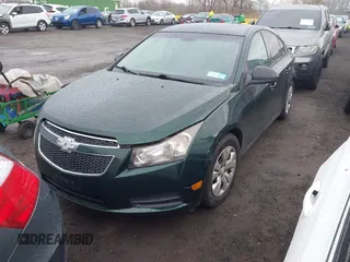 2014 Chevrolet Cruze LS with VIN 1G1PA5SGXE7121449, listed as a IAAI auction lot 41847667 with 161,033 mi miles and . Bid and sale history available at DreamBid. Image 2.