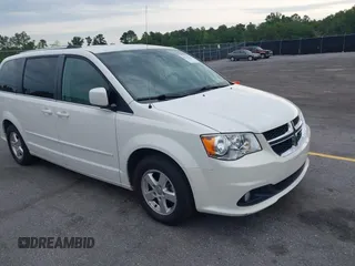 2011 Dodge Grand Caravan Crew with VIN 2D4RN5DG1BR725938, listed as a IAAI auction lot 42213308 with 162,894 mi miles and . Bid and sale history available at DreamBid. Image 1.