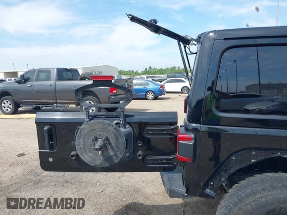 2020 Jeep Wrangler Unlimited Sahara with VIN 1C4HJXEG6LW211932, listed as a IAAI auction lot 42040546 with 74,732 mi miles and . Bid and sale history available at DreamBid. Image 18.