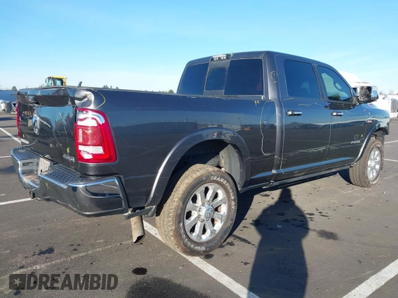 2019 Ram 2500 Laramie with VIN 3C6UR5FL5KG546188, listed as a IAAI auction lot 41361194 with 100,639 mi miles. Bid and sale history available at carsss.com. Image 4.