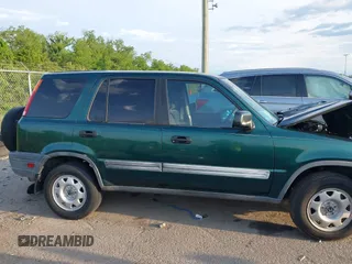1999 Honda CR-V LX z VIN JHLRD2848XC015999, wystawiony jako IAAI lot #42150718 z przebiegiem 161 389 mil mil oraz . Historia ofert i sprzedaży dostępna na DreamBid. Obrazek 13.