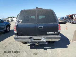 1999 Chevrolet Suburban with VIN 1GNGK26R5XJ513945, listed as a Copart auction lot 73673314 with 198,656 mi miles and Clean Title. Bid and sale history available at carsss.com. Image 6.