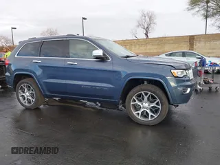 2019 Jeep Grand Cherokee Overland with VIN 1C4RJFCG6KC726690, listed as a IAAI auction lot 41421299 with 116,190 mi miles. Bid and sale history available at carsss.com. Image 14.