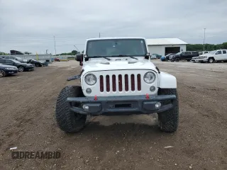 2016 Jeep Wrangler Unlimited Rubicon with VIN 1C4HJWFG9GL223928, listed as a Copart auction lot 58182125 with 57,711 mi miles and Salvage title. Bid and sale history available at DreamBid. Image 5.