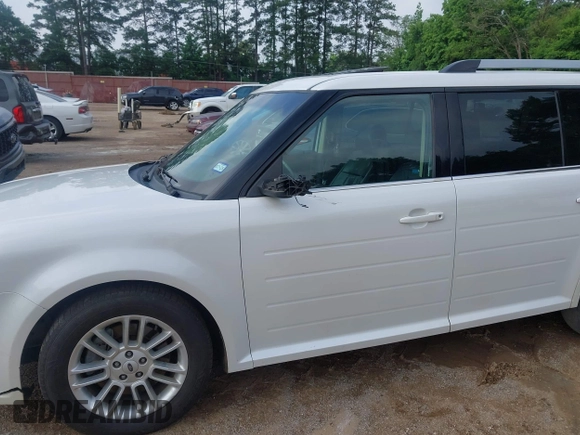 2014 Ford Flex SEL z VIN 2FMGK5C8XEBD00203, wystawiony jako IAAI lot #42304671 z przebiegiem 109 639 mil mil oraz . Historia ofert i sprzedaży dostępna na DreamBid. Obrazek 6.