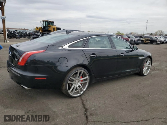 2014 Jaguar XJ Portfolio with VIN SAJWJ2GD4E8V69651, listed as a Copart auction lot 52426195 with 56,413 mi miles and Salvage title. Bid and sale history available at DreamBid. Image 3.