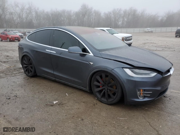 2017 Tesla Model X P100D with VIN 5YJXCBE48HF052633, listed as a Copart auction lot 38883234 with NaN miles and Salvage Title. Bid and sale history available at carsss.com. Image 4.