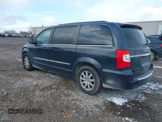 2013 Chrysler Town & Country Touring with VIN 2C4RC1BGXDR613852, listed as a IAAI auction lot 40973841 with 150,234 mi miles. Bid and sale history available at carsss.com. Image 3.