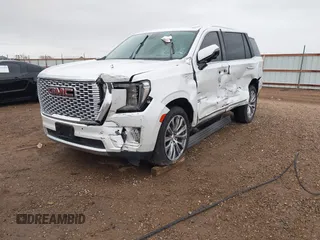 2021 GMC Yukon Denali with VIN 1GKS2DKL0MR178210, listed as a IAAI auction lot 41934532 with 91,785 mi miles. Bid and sale history available at carsss.com. Image 2.