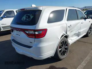 2017 Dodge Durango R/T with VIN 1C4SDHCT8HC736891, listed as a IAAI auction lot 41329282 with 92,738 mi miles and . Bid and sale history available at DreamBid. Image 4.