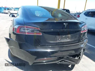 2021 Tesla Model S Long Range z VIN 5YJSA1E54MF429360, wystawiony jako IAAI lot #42662440 z przebiegiem 36 395 mil mil oraz . Historia ofert i sprzedaży dostępna na DreamBid. Obrazek 6.