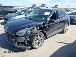 2020 Ford Escape Titanium Hybrid with VIN 1FMCU0DZ9LUC08090, listed as a IAAI auction lot 41674697 with 43,586 mi miles and . Bid and sale history available at DreamBid. Image 17.