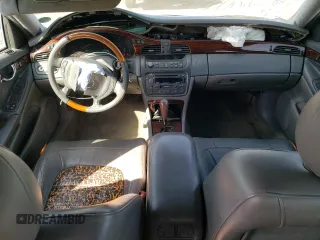 2004 Cadillac DeVille DTS z VIN 1G6KF57994U203706, wystawiony jako Copart lot #76278324 z przebiegiem 203 709 mil mil oraz Szkoda całkowita • Salvage title. Historia ofert i sprzedaży dostępna na DreamBid. Obrazek 8.