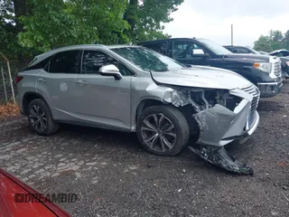 2018 Lexus RX 350 z VIN 2T2ZZMCA4JC100212, wystawiony jako IAAI lot #42197456 z przebiegiem 63 078 mil mil oraz . Historia ofert i sprzedaży dostępna na DreamBid. Obrazek 12.