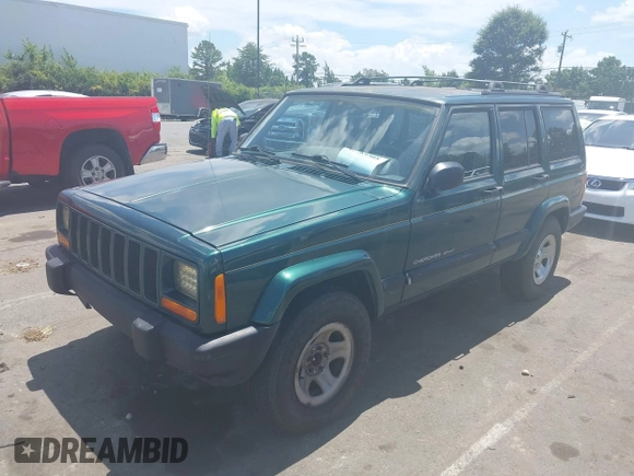 2000 Jeep Cherokee z VIN 1J4FT48S7YL134491, wystawiony jako IAAI lot #42789305 z przebiegiem 180 886 mil mil oraz . Historia ofert i sprzedaży dostępna na DreamBid. Obrazek 2.