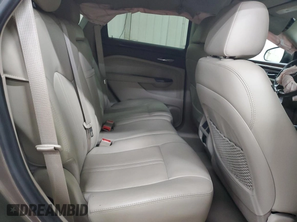 2014 Cadillac SRX Luxury Collection z VIN 3GYFNEE34ES652268, wystawiony jako Copart lot #54136545 z przebiegiem 99 542 mil mil oraz Szkoda całkowita • Salvage title. Historia ofert i sprzedaży dostępna na DreamBid. Obrazek 10.