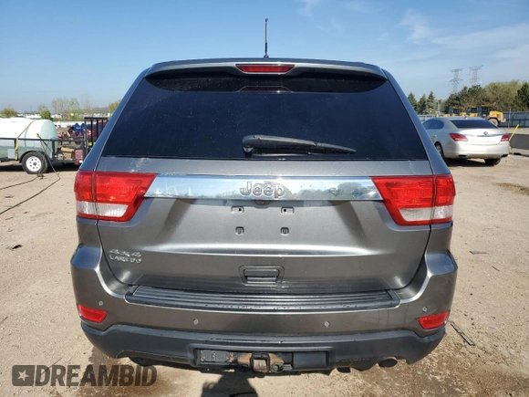 2011 Jeep Grand Cherokee Laredo with VIN 1J4RR4GGXBC642759, listed as a Copart auction lot 55767575 with 144,104 mi miles and Salvage title. Bid and sale history available at DreamBid. Image 6.