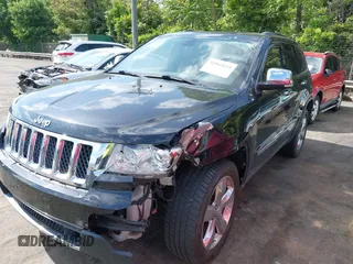 2013 Jeep Grand Cherokee Overland with VIN 1C4RJECT3DC526005, listed as a IAAI auction lot 42064151 with 112,777 mi miles and . Bid and sale history available at DreamBid. Image 17.