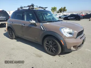 2013 MINI Countryman S ALL4 z VIN WMWZC5C51DWP30390, wystawiony jako Copart lot #59869105 z przebiegiem 111 843 mil mil oraz Szkoda całkowita • Salvage title. Historia ofert i sprzedaży dostępna na DreamBid. Obrazek 4.