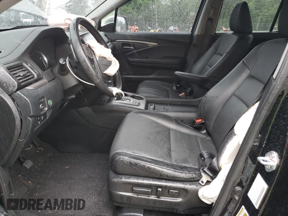 2023 Honda Ridgeline RTL with VIN 5FPYK3F51PB067811, listed as a Copart auction lot 56795995 with 21,500 mi miles and Salvage title. Bid and sale history available at DreamBid. Image 7.