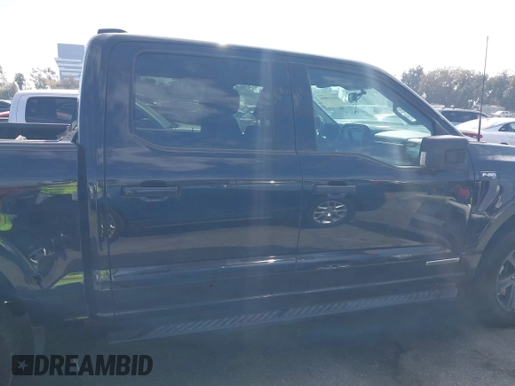 2023 Ford F-150 XL with VIN 1FTFW1ED8PFD08597, listed as a IAAI auction lot 41613094 with 7,266 mi miles and . Bid and sale history available at carsss.com. Image 13.