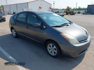 2007 Toyota Prius z VIN JTDKB20U873207231, wystawiony jako IAAI lot #42465998 z przebiegiem Nie podano mil oraz . Historia ofert i sprzedaży dostępna na DreamBid. Obrazek 1.