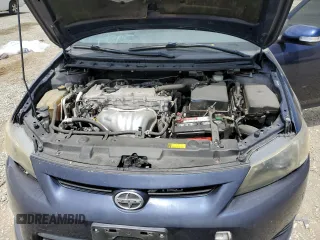 2013 Scion tC z VIN JTKJF5C76D3063027, wystawiony jako Copart lot #56604955 z przebiegiem 109 813 mil mil oraz Szkoda całkowita • Salvage title. Historia ofert i sprzedaży dostępna na DreamBid. Obrazek 11.
