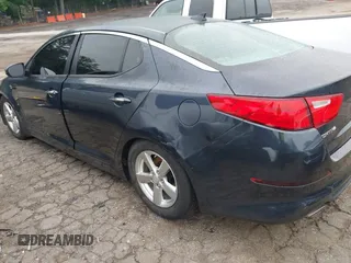 2015 Kia Optima LX with VIN 5XXGM4A70FG486256, listed as a IAAI auction lot 42211318 with 141,515 mi miles and . Bid and sale history available at DreamBid. Image 6.