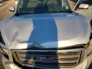 2015 GMC Yukon XL SLE z VIN 1GKS1GKC7FR285469, wystawiony jako Copart lot #81177424 z przebiegiem Nie podano mil oraz Czysty tytuł • Clean title. Historia ofert i sprzedaży dostępna na DreamBid. Obrazek 12.