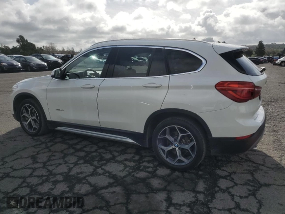2017 BMW X1 sDrive28i with VIN WBXHU7C33H5H32827, listed as a Copart auction lot 50348265 with 117,412 mi miles and Salvage Title. Bid and sale history available at carsss.com. Image 2.