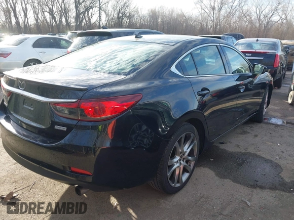 2014 Mazda 6 i Grand Touring with VIN JM1GJ1W66E1162519, listed as a IAAI auction lot 41801957 with 121,586 mi miles. Bid and sale history available at carsss.com. Image 4.