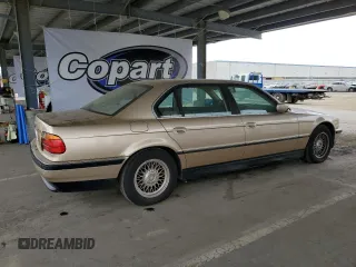 1998 BMW 7 Series 740il with VIN WBAGJ832XWDM11394, listed as a Copart auction lot 54390685 with 126,828 mi miles and Clean Title. Bid and sale history available at carsss.com. Image 3.