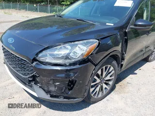 2020 Ford Escape Titanium with VIN 1FMCU9J92LUA27373, listed as a IAAI auction lot 42650077 with 42,179 mi miles and . Bid and sale history available at DreamBid. Image 6.