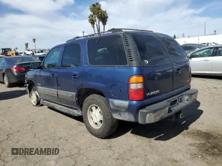 2001 GMC Yukon SLT z VIN 1GKEC13T21J264040, wystawiony jako Copart lot #46282145 z przebiegiem 136 264 mil mil oraz Szkoda całkowita • Salvage title. Historia ofert i sprzedaży dostępna na DreamBid. Obrazek 2.
